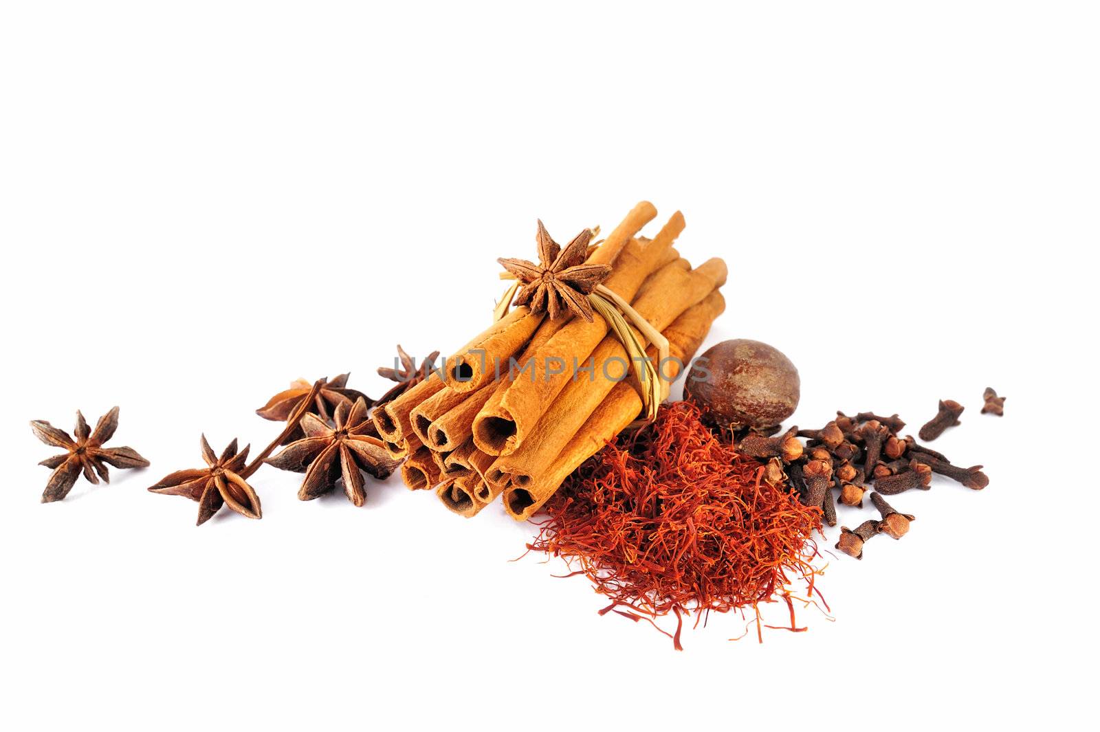 A bundle of dry cinnamon sticks and spice