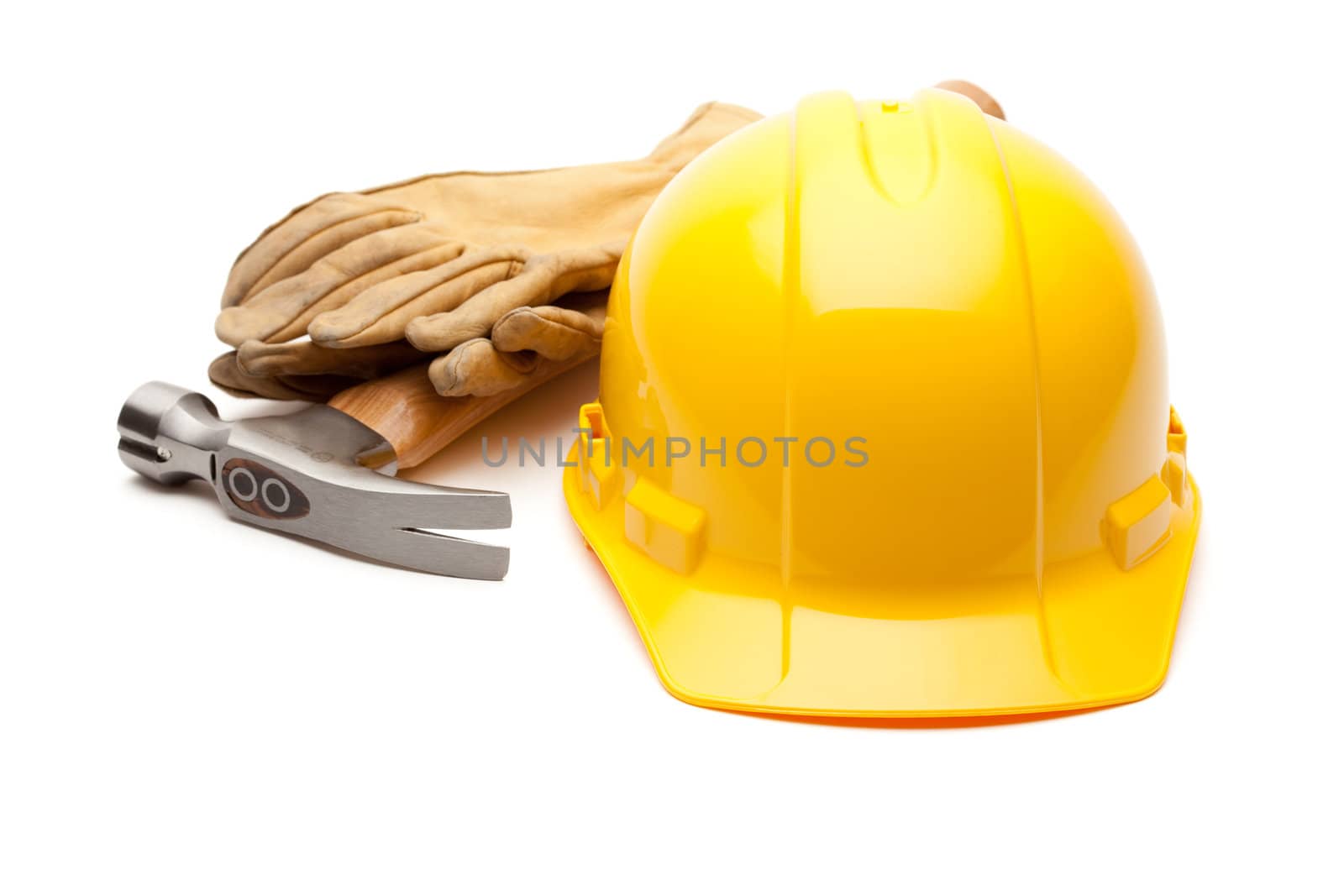 Yellow Hard Hat, Gloves and Hammer Isolated on White.