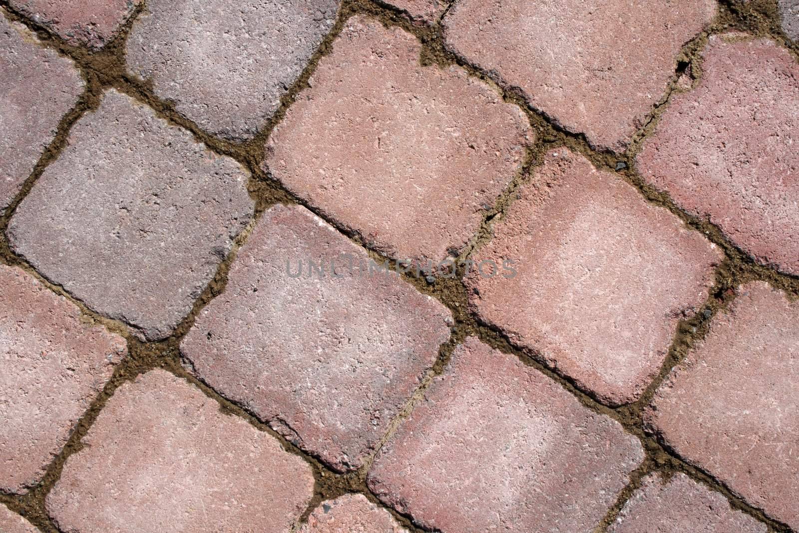 Texture of paving � diagonal stone tile pattern.