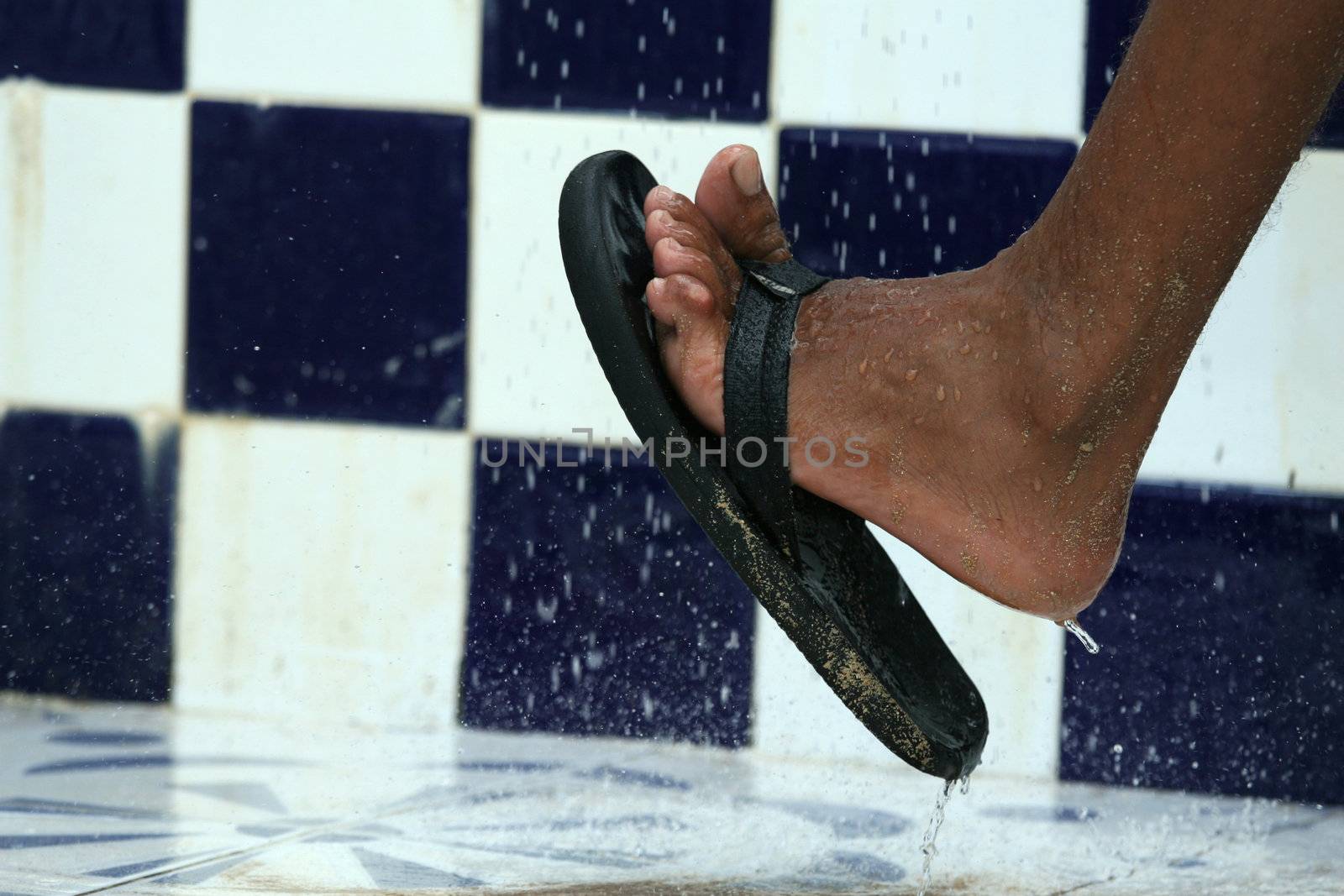 Foot under shower by marina_foto