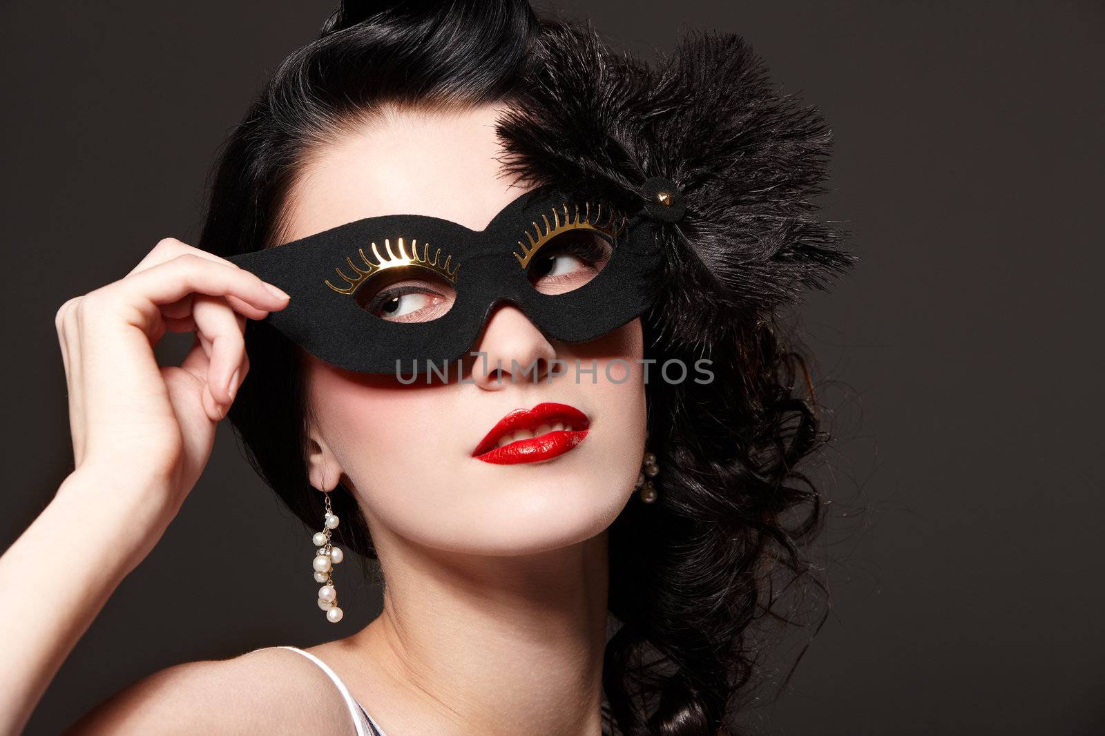 Woman in carnival mask by mihhailov