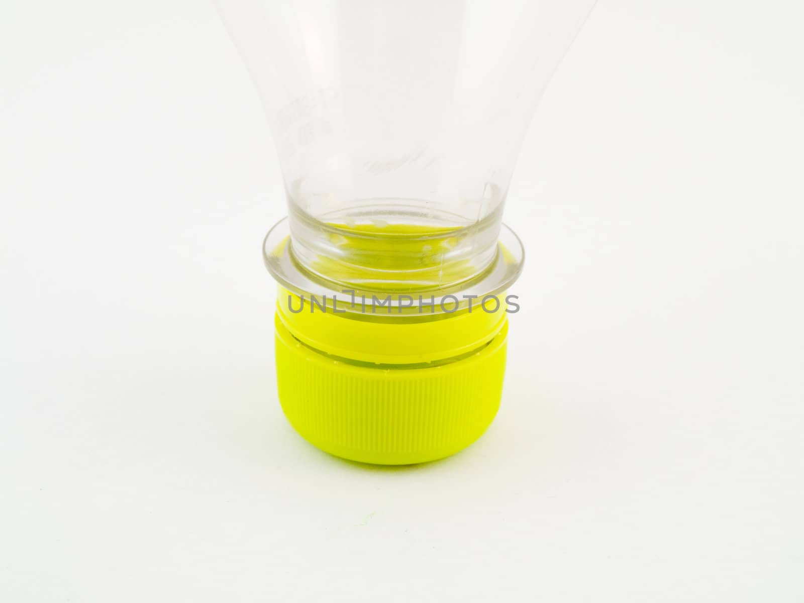 PVCu Plastic Bottle With Green Cap Screwed on Clear Bottle