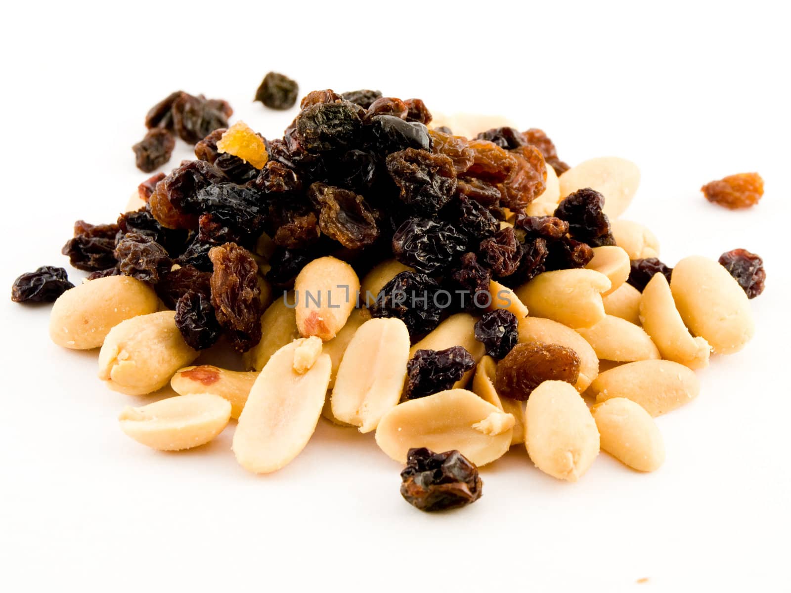 Stack Pile of Peanuts and Raisins on White Background by bobbigmac