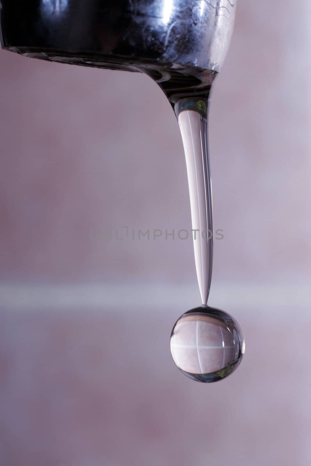 The image of a drop with reflection inside