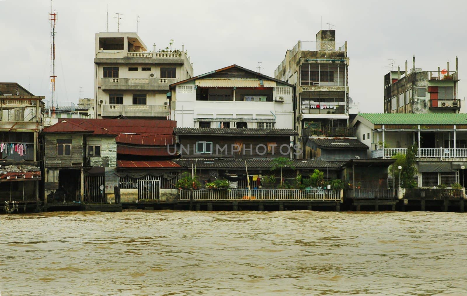 Bangkok � city of contrasts, canals skyscrapers and slums, markets and sanctuaries.