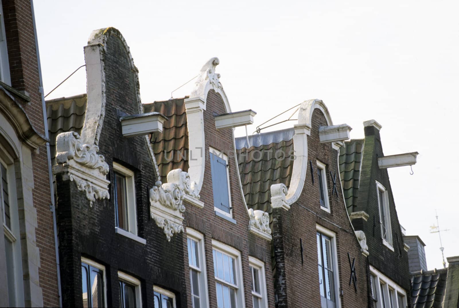 Hooks for lifting furniture are a common feature of Amsterdam's traditional canal houses.