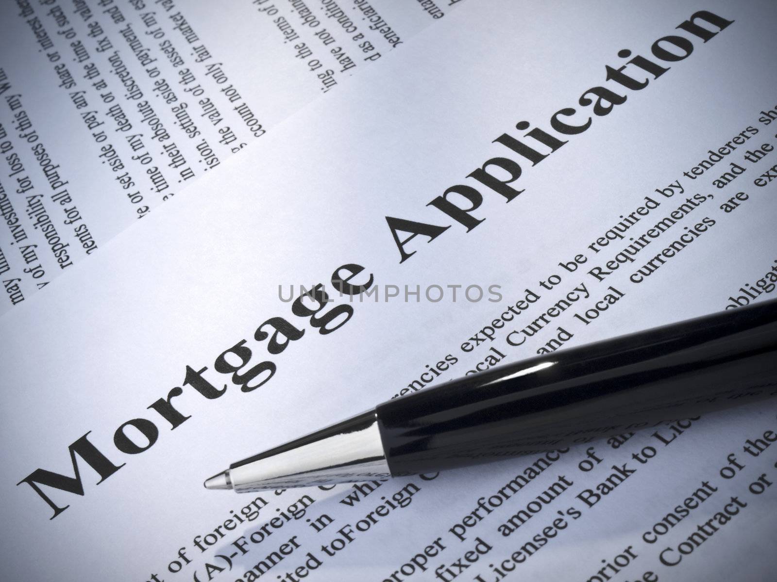 Close up of a mortgage application and a pen.