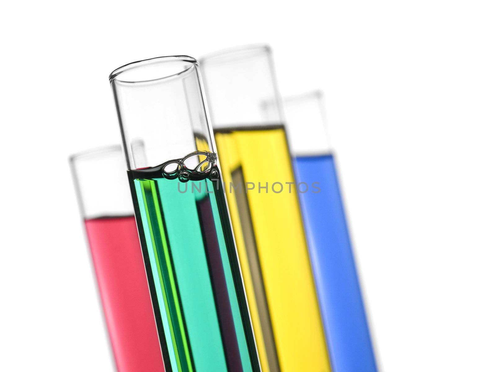 Four test tubes filled with colored liquids. Isolated on white.