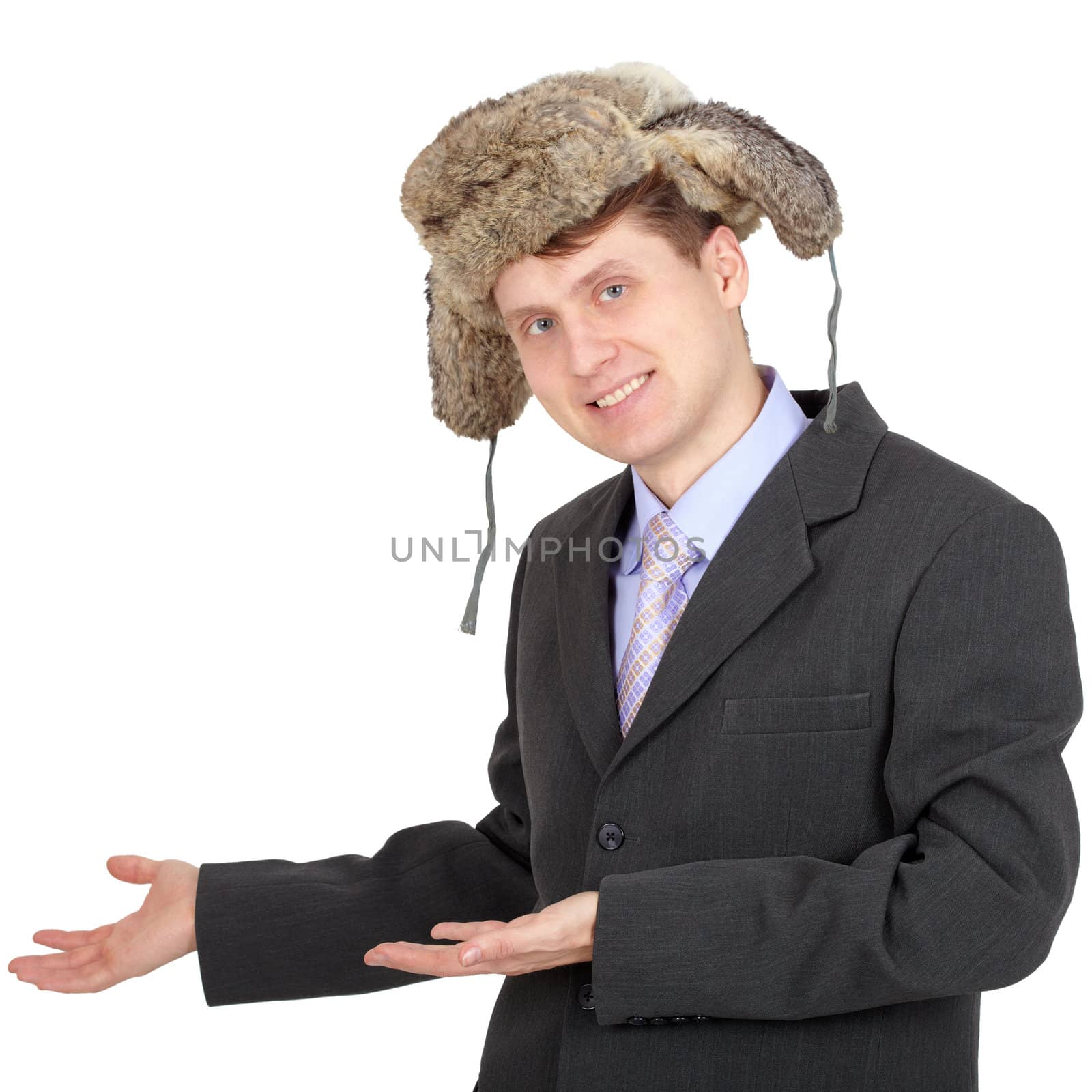 The young hospitable russian businessman in the fur hat