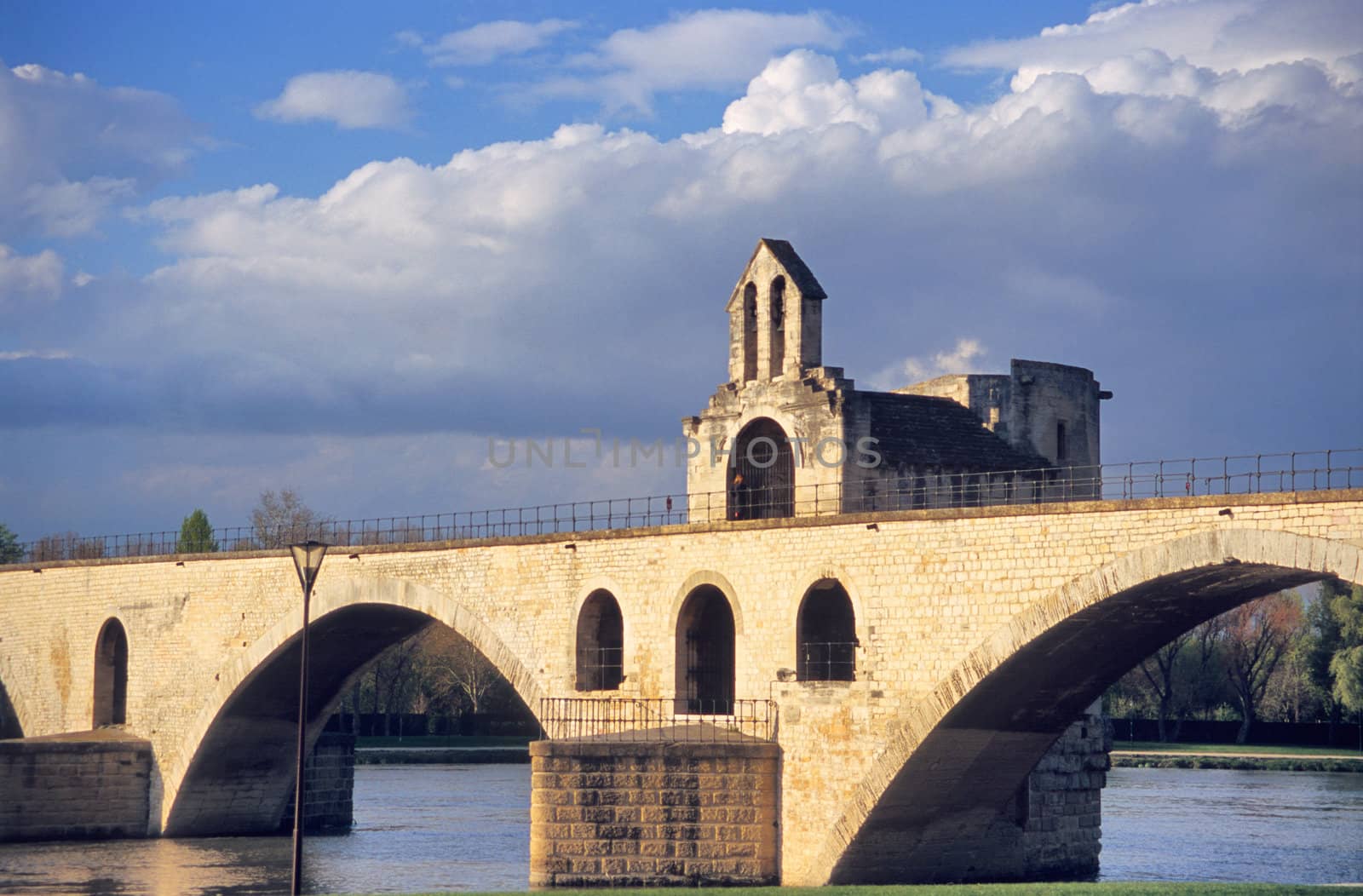 The famous St. Benezet bridge in Avignon, France made famous by the folk song "Sur la Pont D'Avignon."
