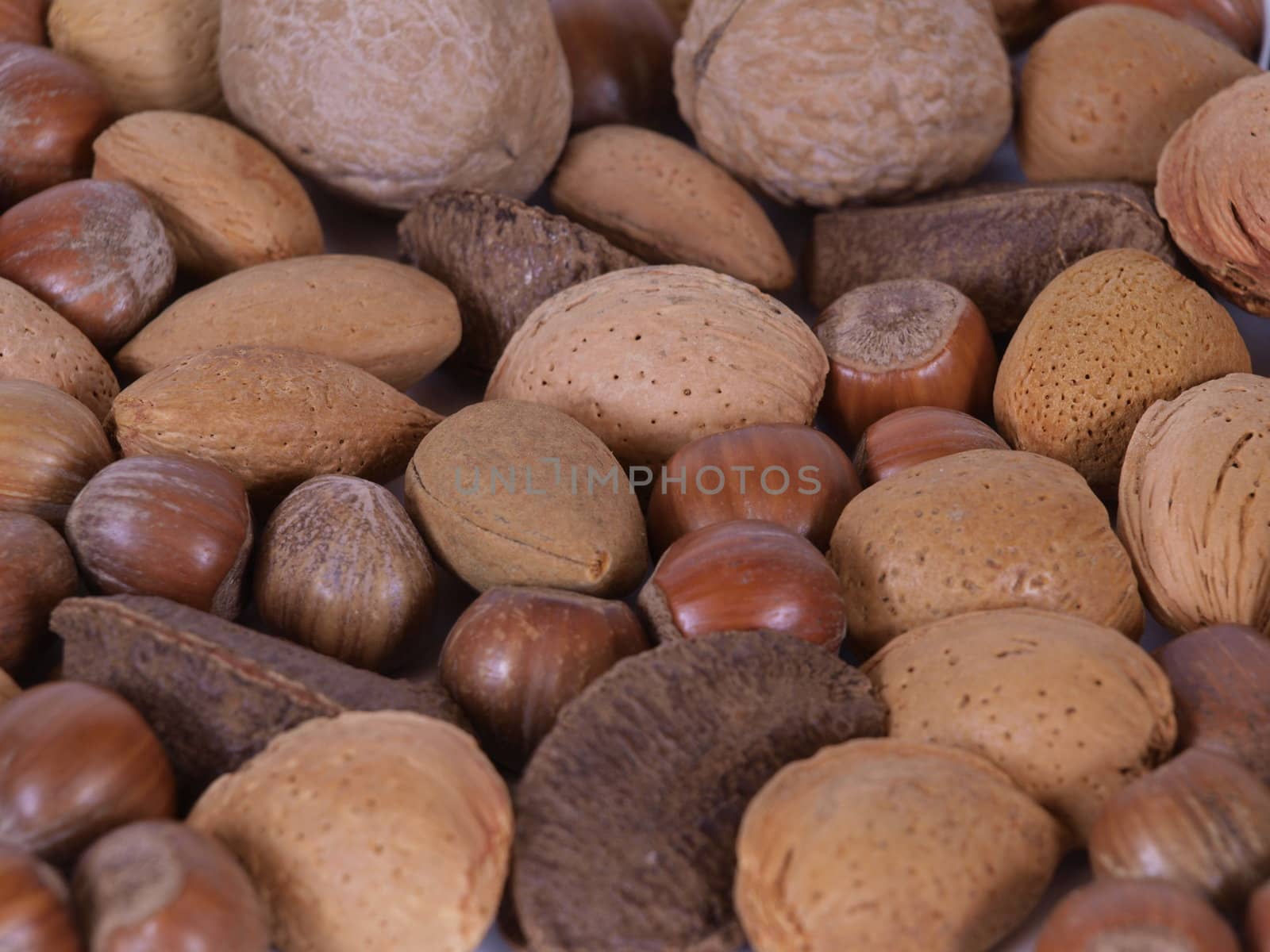 Closeup of mixed Nuts with ni background