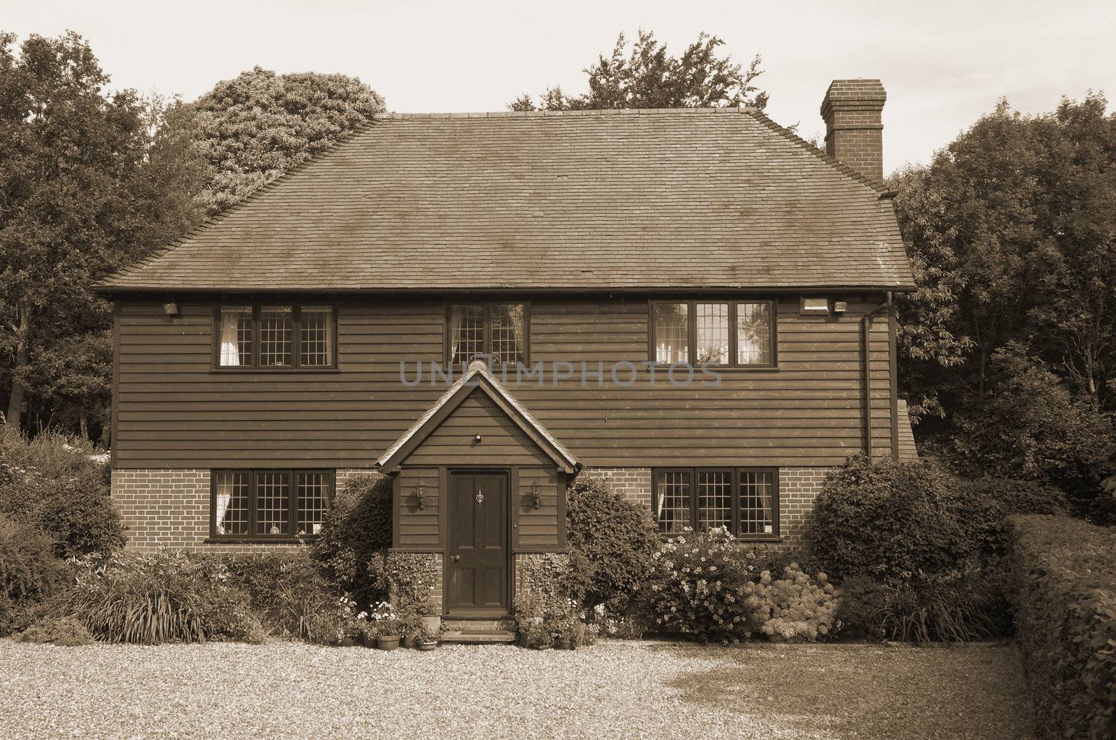 A nice home in the countryside, sepia toned