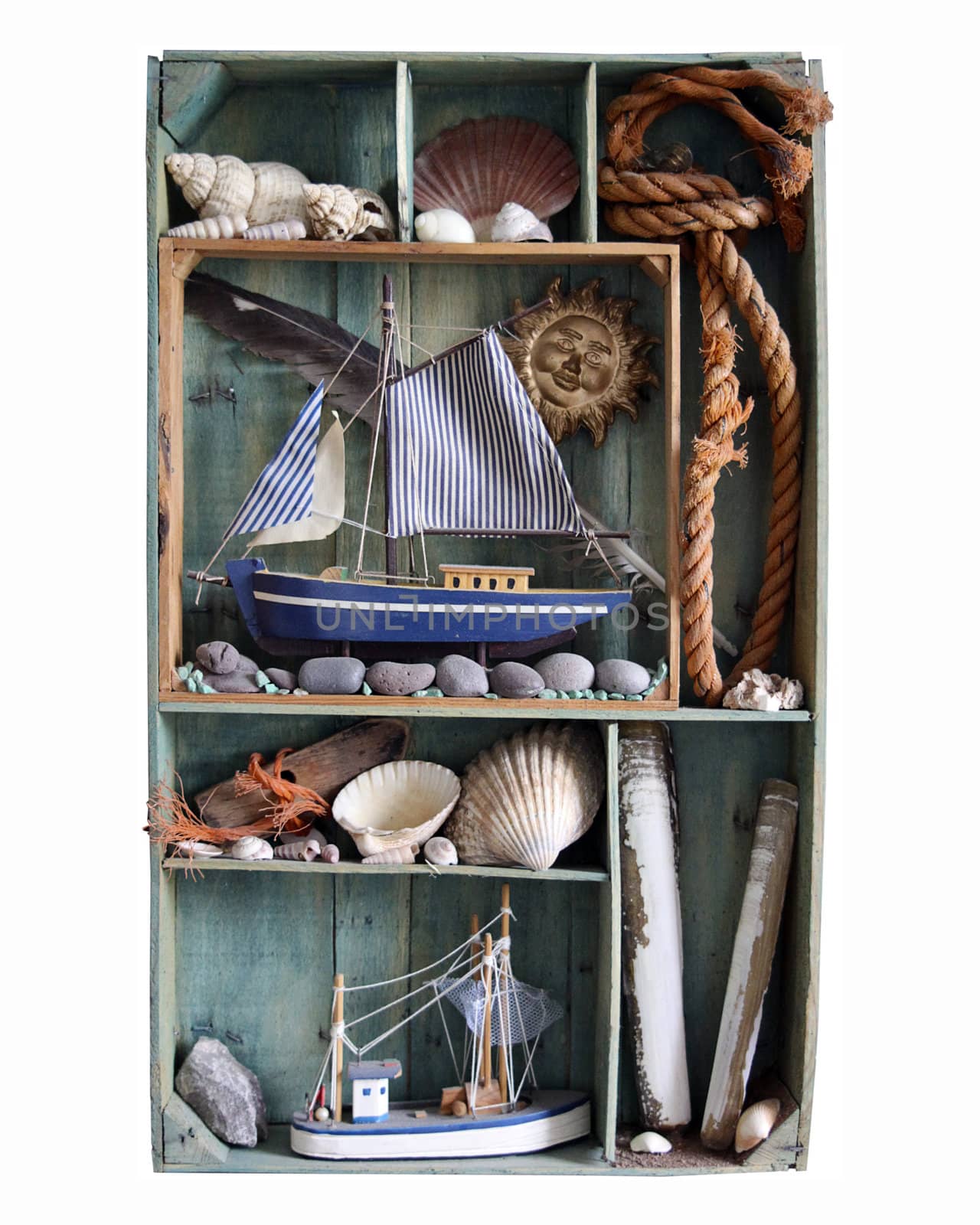  A collection of items collected from the beach set in a portrait format boxed frame made from an old wooden fruit box.
