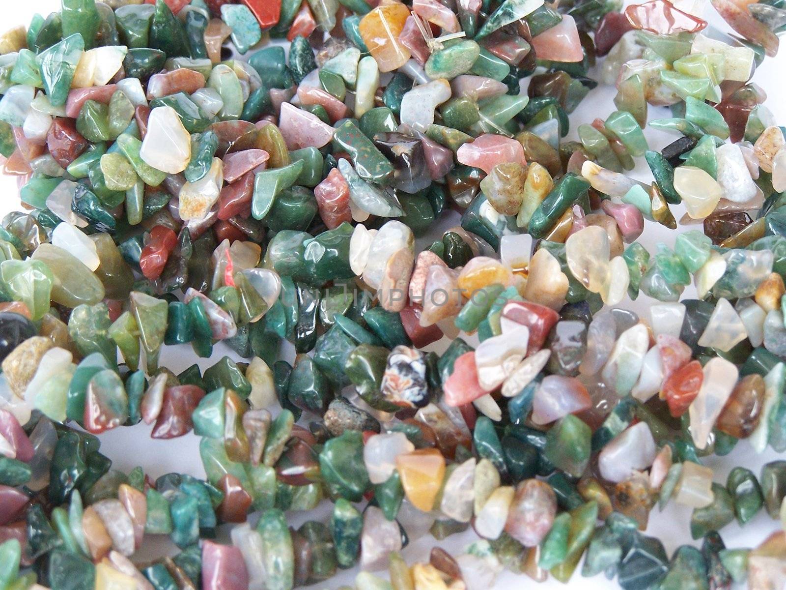 Different jasper gem stones. Background. Close up.