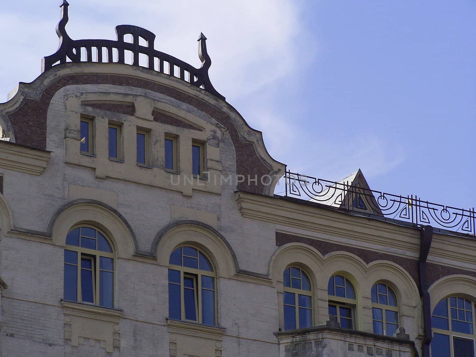 Old building with decoration on it's roof.