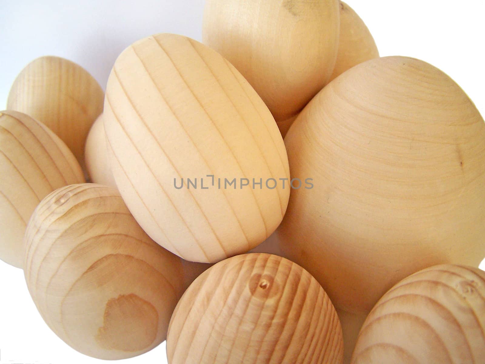 Isolated easter wooden eggs. Close up.