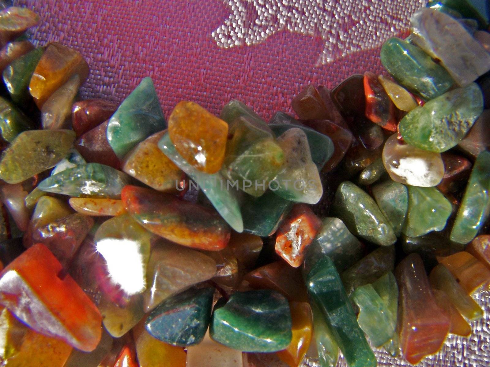Jasper stone gems. Different colors. Macro. Sunlight.