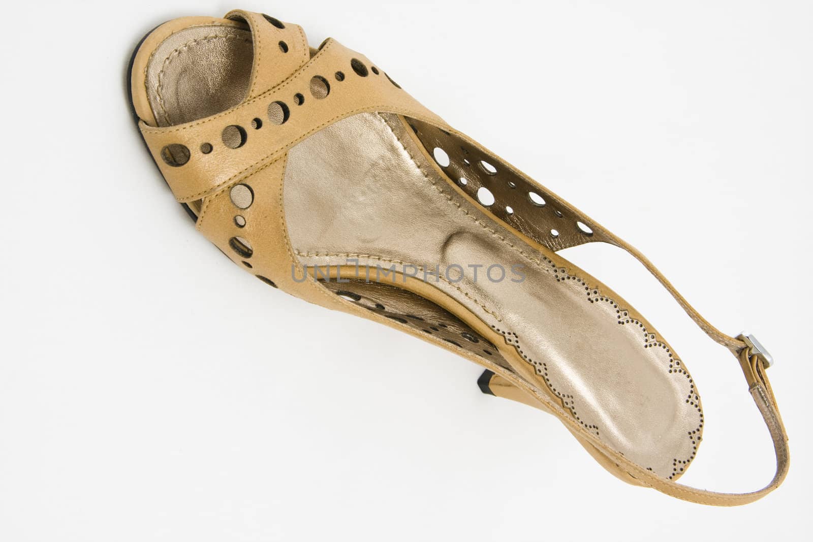 light brown high heel shoe on white