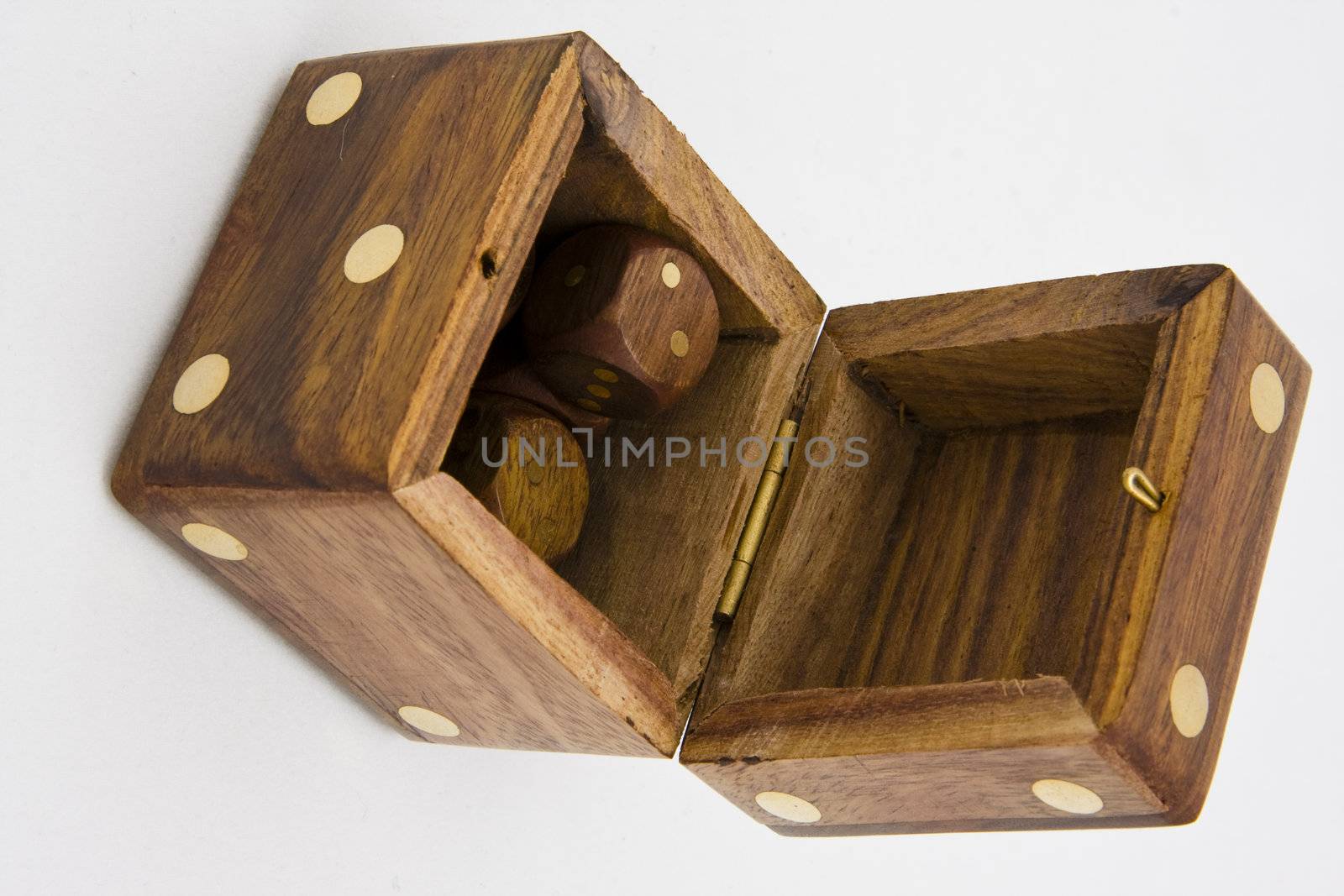 open wooden dice with smaller dices inside on white
