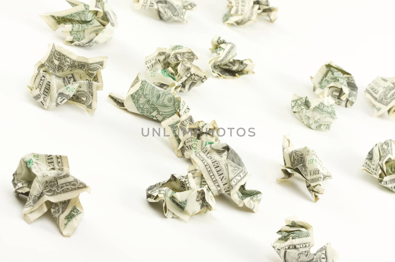 Crumpled Dollars on a White Background.