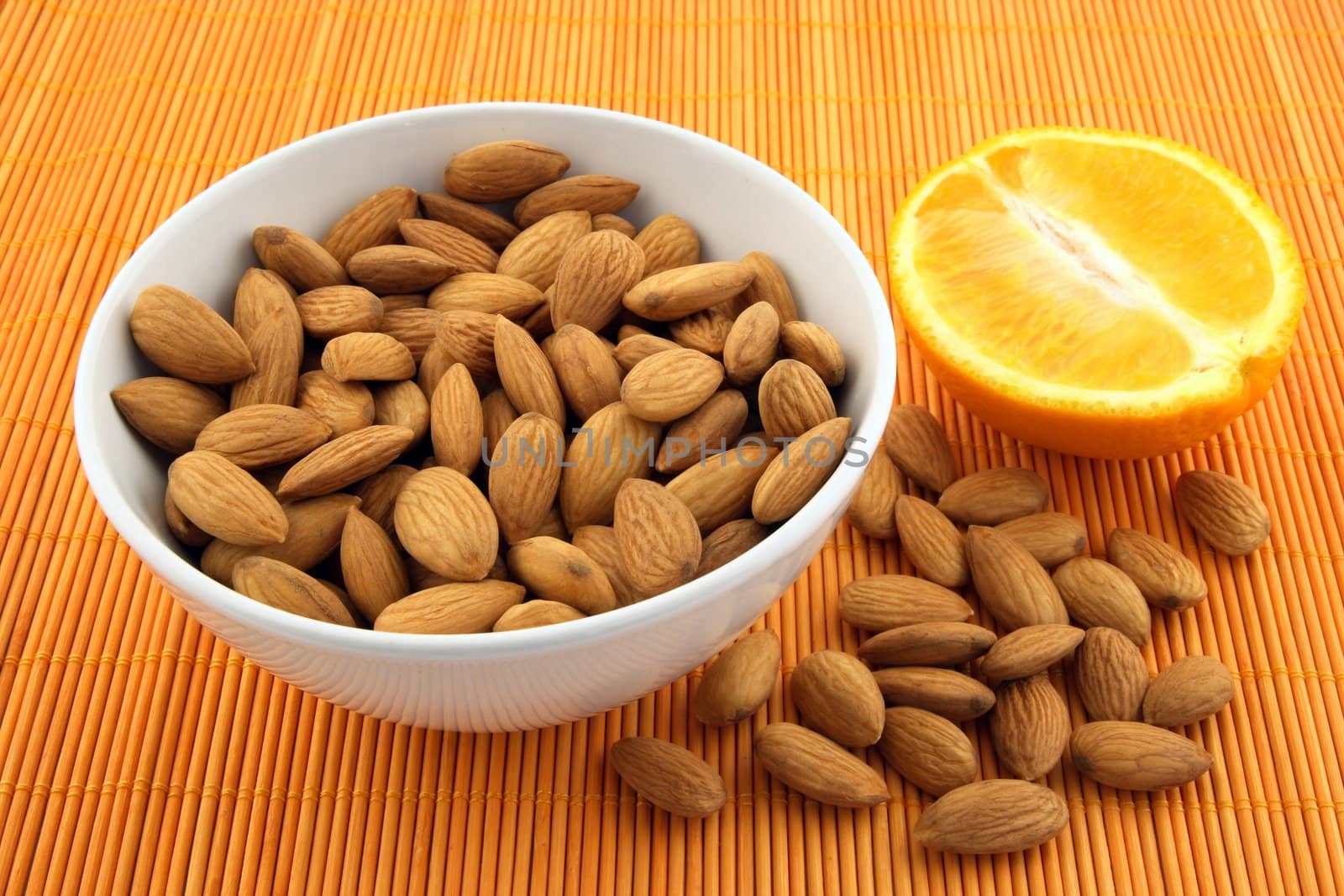 Fresh almonds and orange by anikasalsera