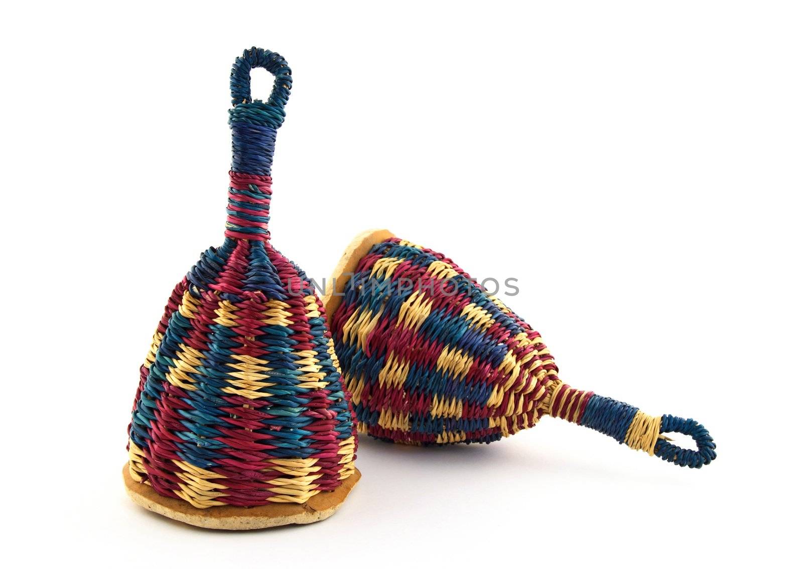 Two colorful caxixi, traditional Afro-Brazilian musical instrument.