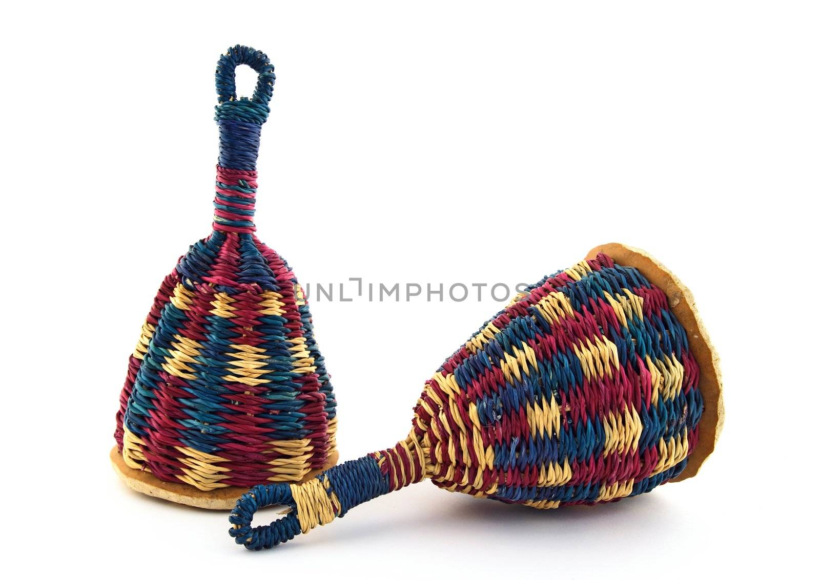 Two colorful caxixi, traditional Afro-Brazilian percussion instrument.