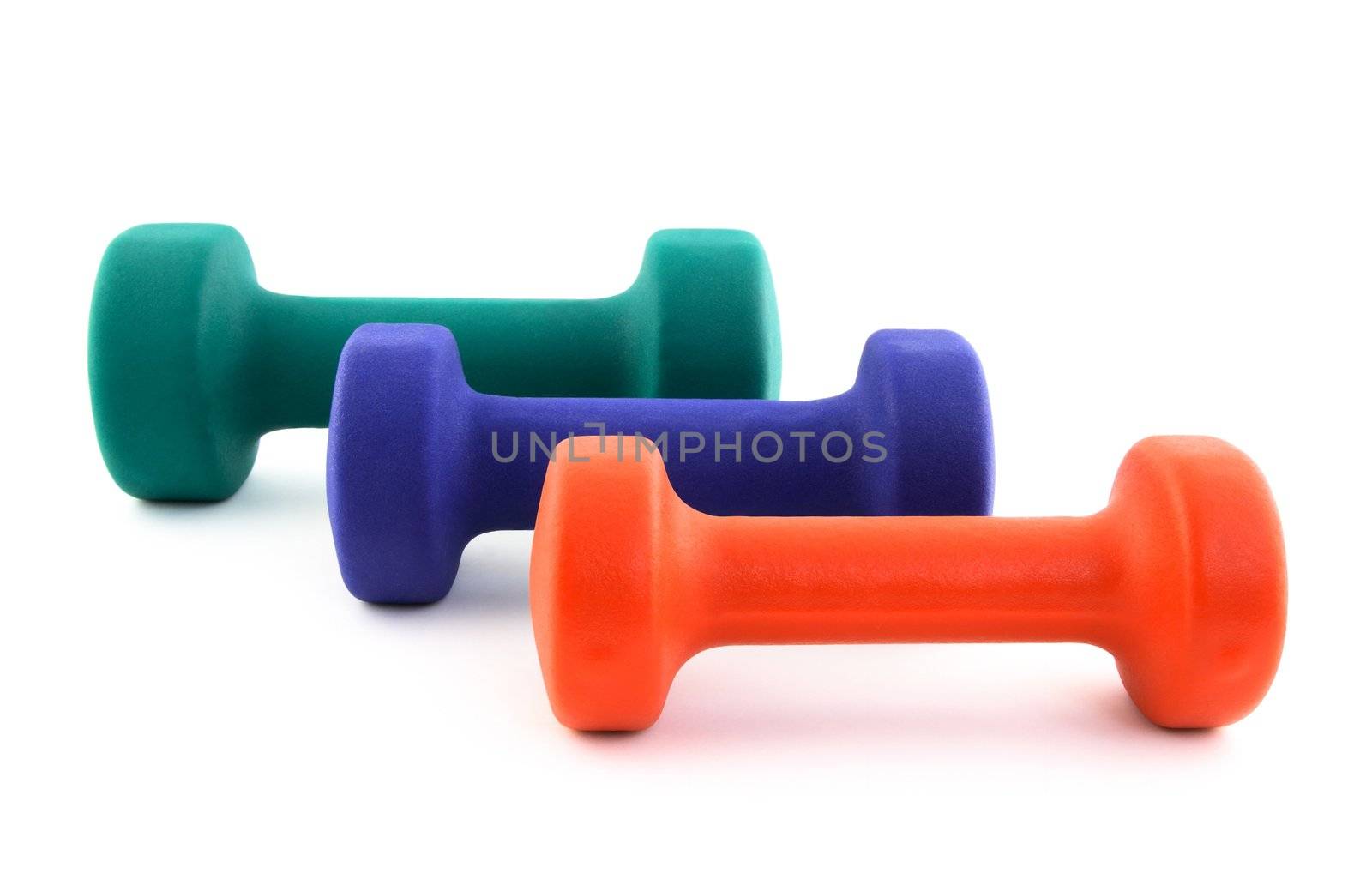 Three dumbbells of different colors of white background.
