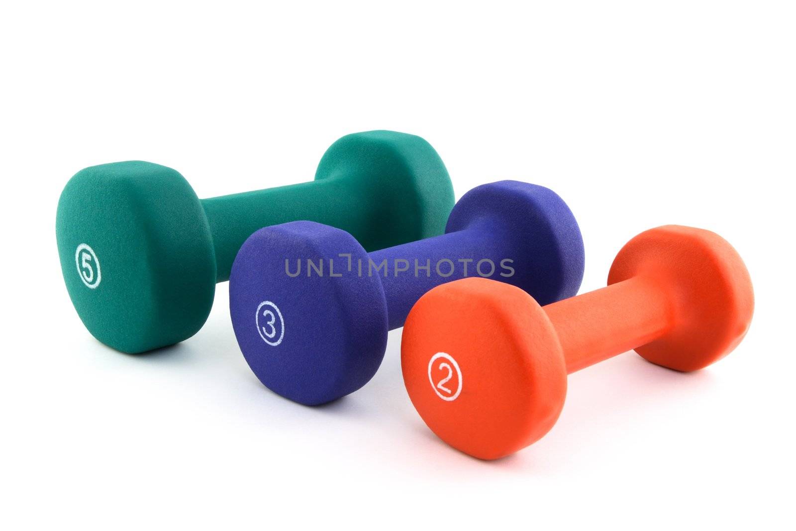 Three colorful dumbbells of different size of white background.