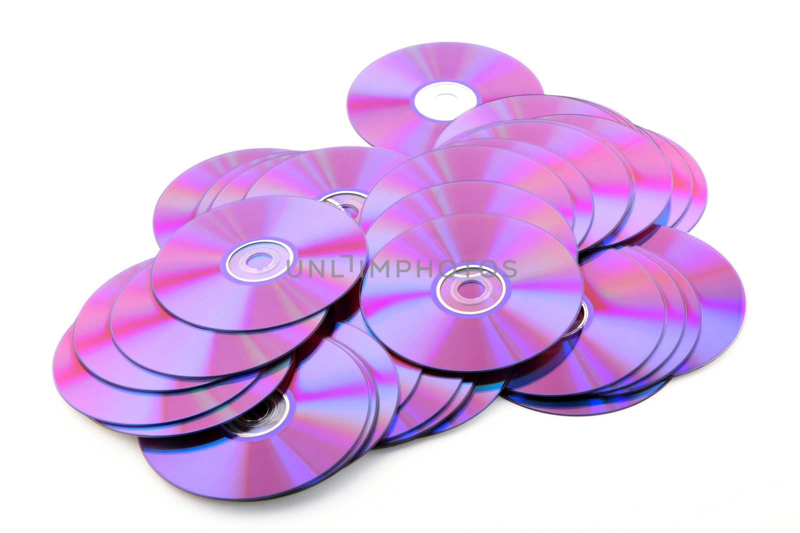 Pile of colorful purple DVDs or CDs on white background. No dust.