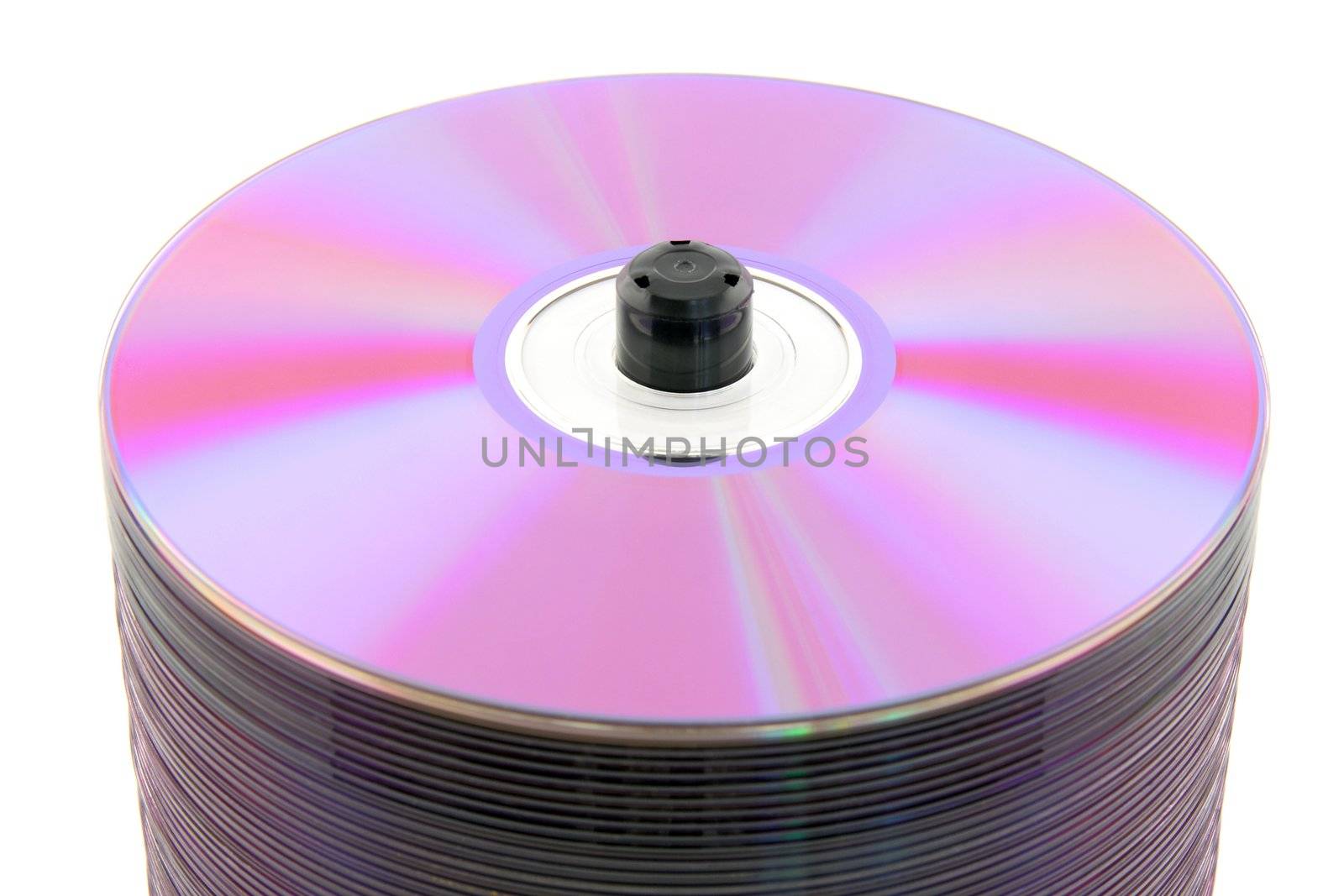 Close-up of purple DVDs or CDs on spindle, on white background. No dust.
