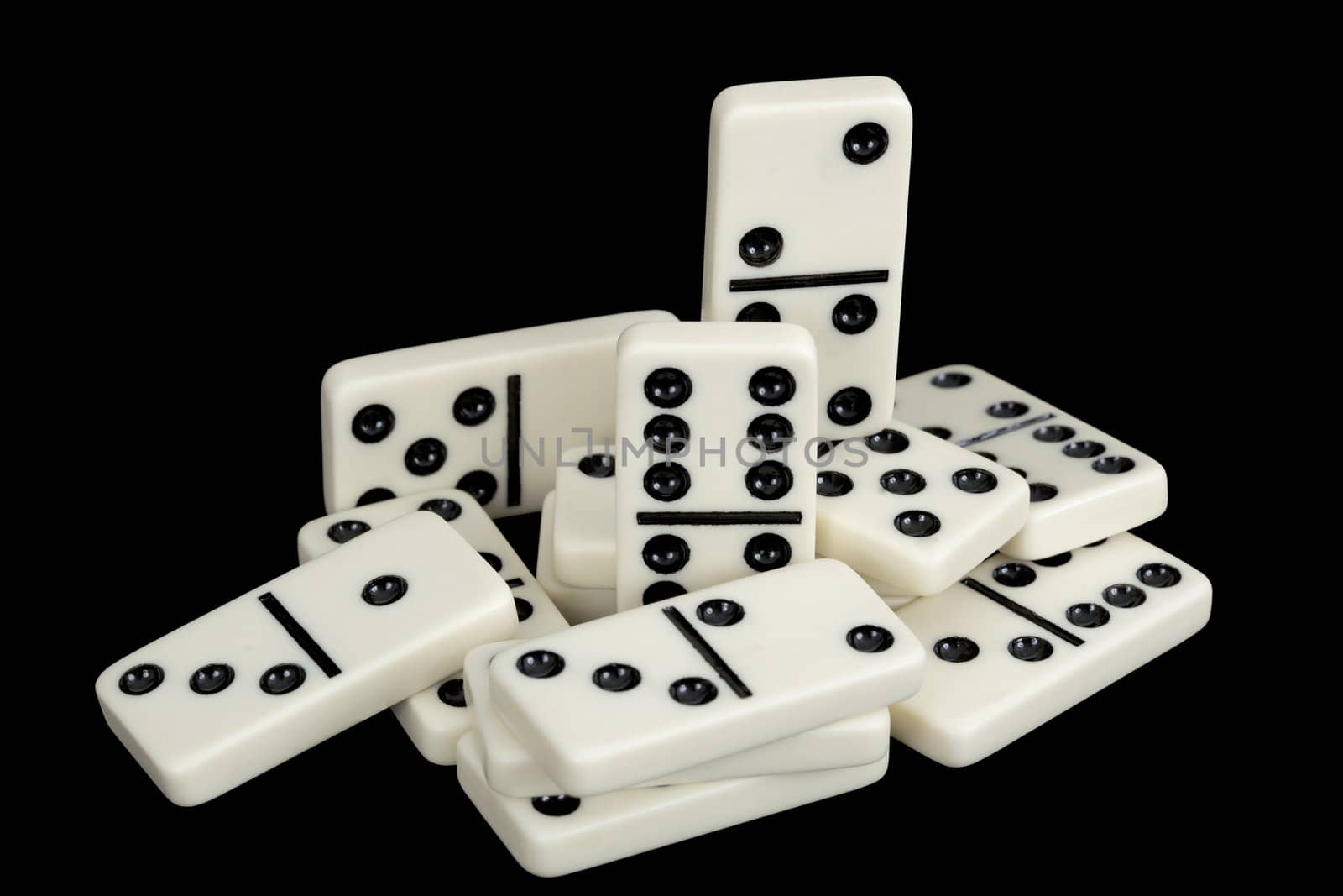A bunch of dominoes isolated on a black background