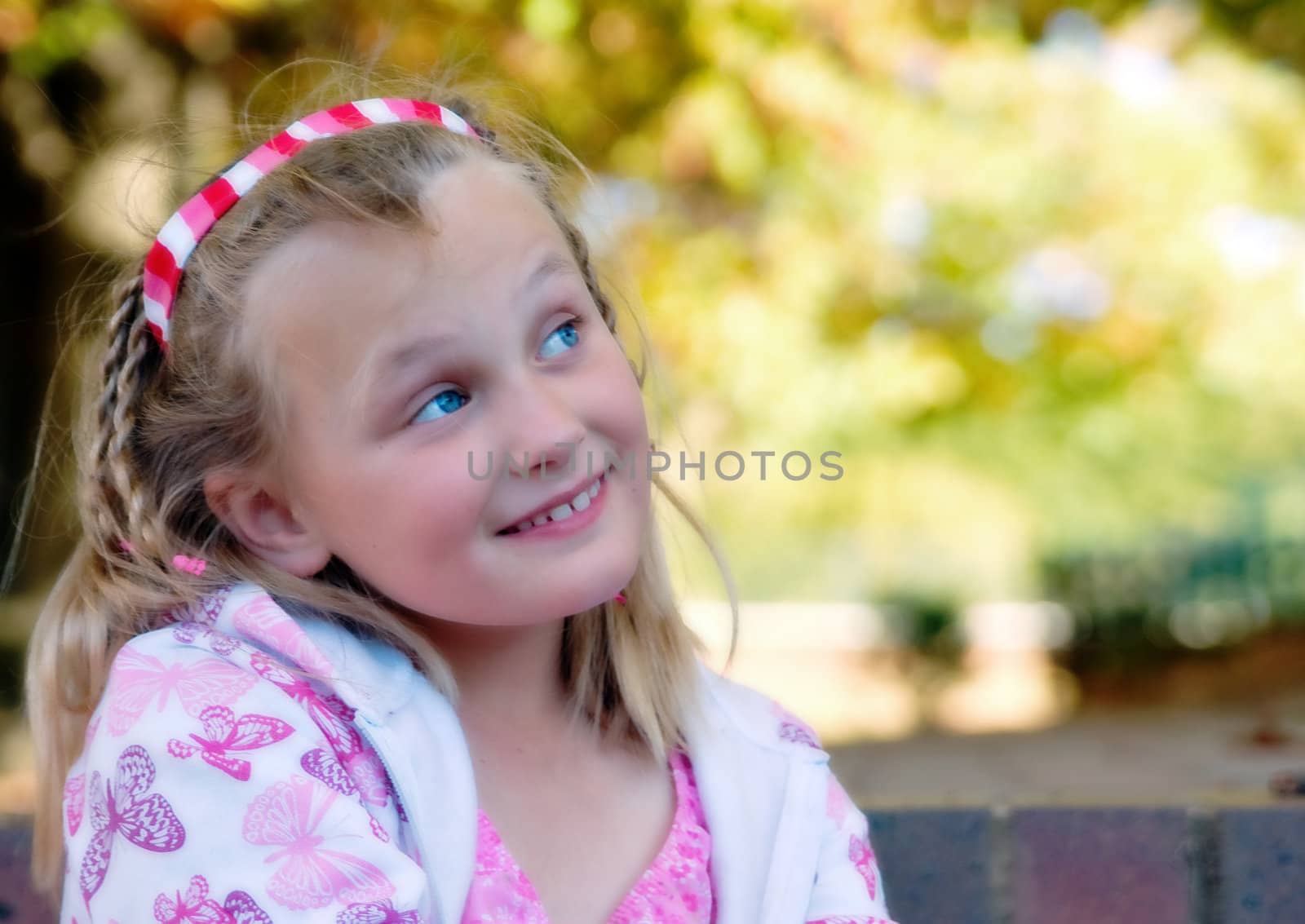 soft and dreamy focus image of a young girl wistful and waiting