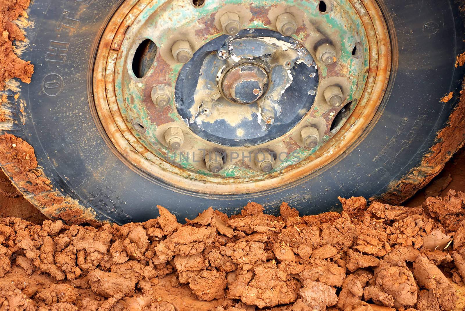 truck tyre bogged or stuck in in the mud