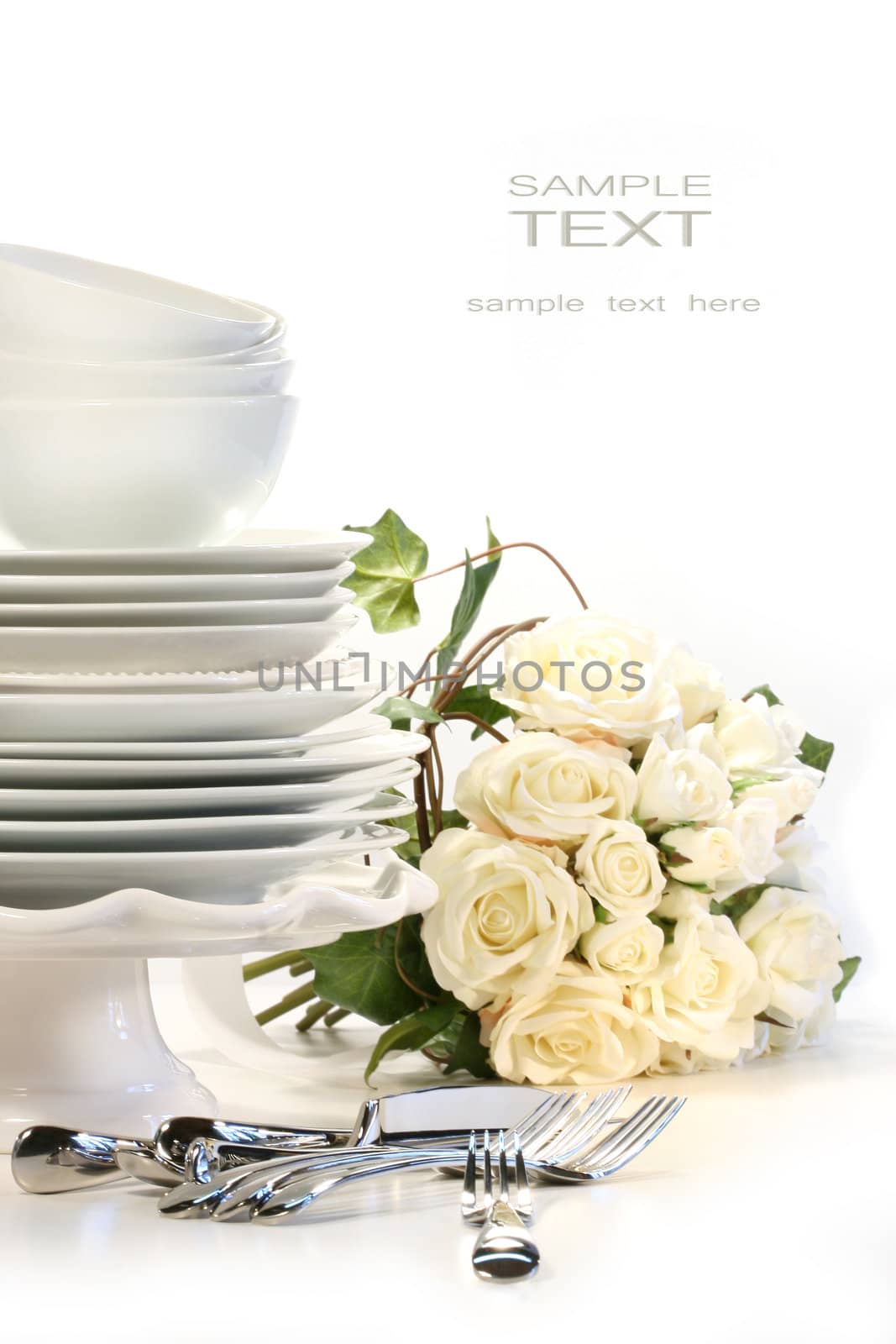 Assortment of plates for wedding on white background