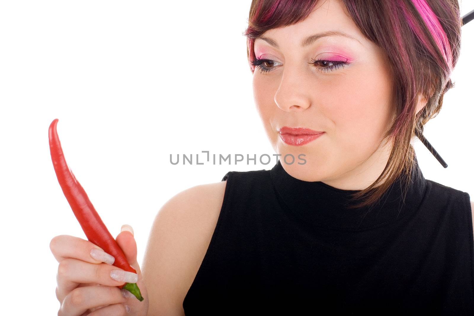 Sexy hot woman looking at red chilli peppers