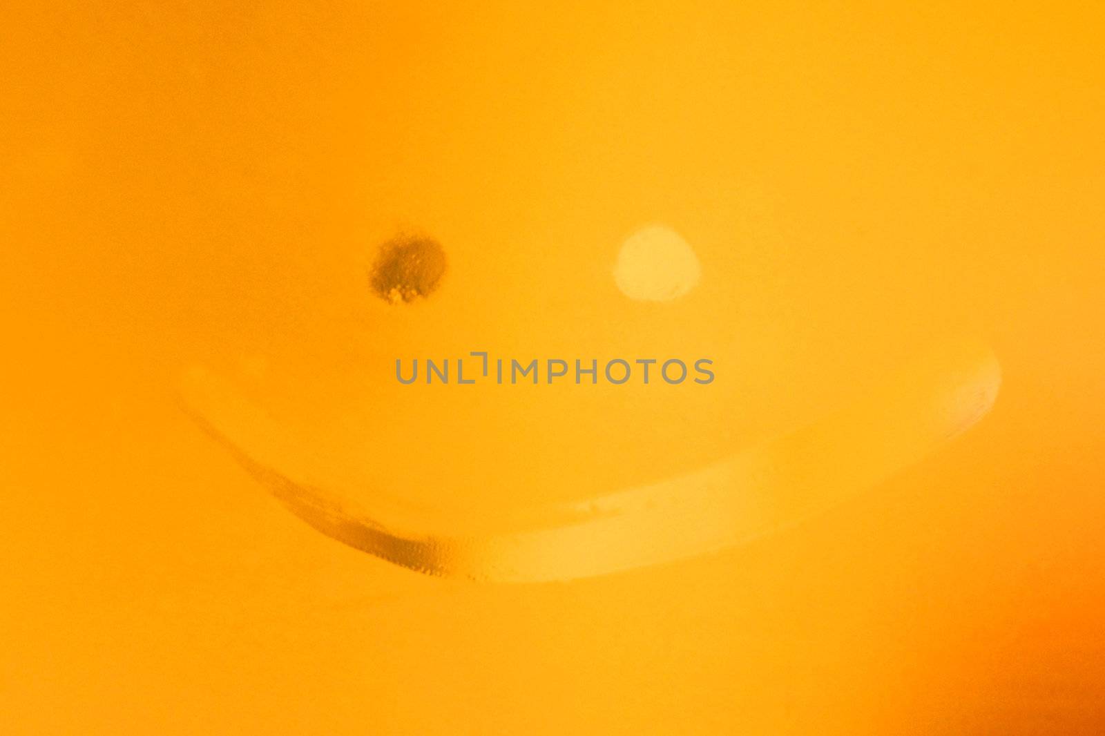 Mirror funny smiling face in the bathroom