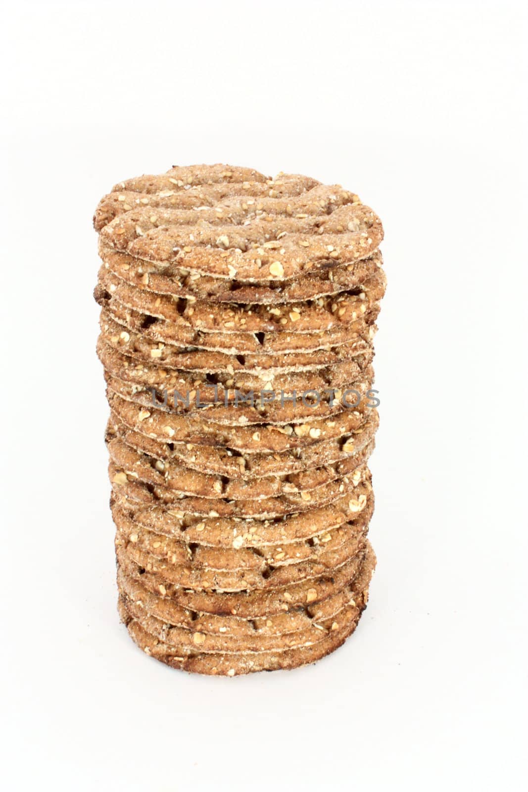 Stack of round crispbread isolated on white