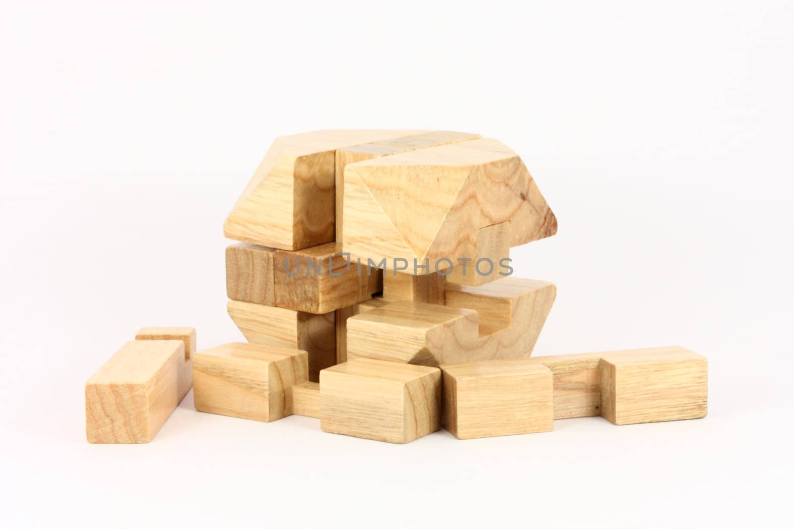Wooden puzzle isolated on an white background