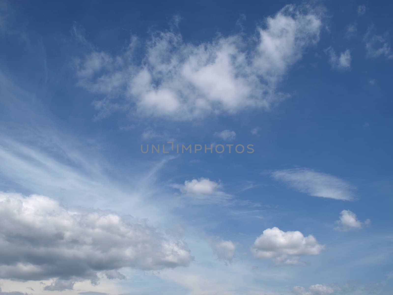 image of a Provence blue sky with a few clouds