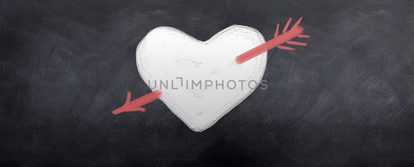 A red arrow is shot through a white heart. Written in chalk on a blackboard