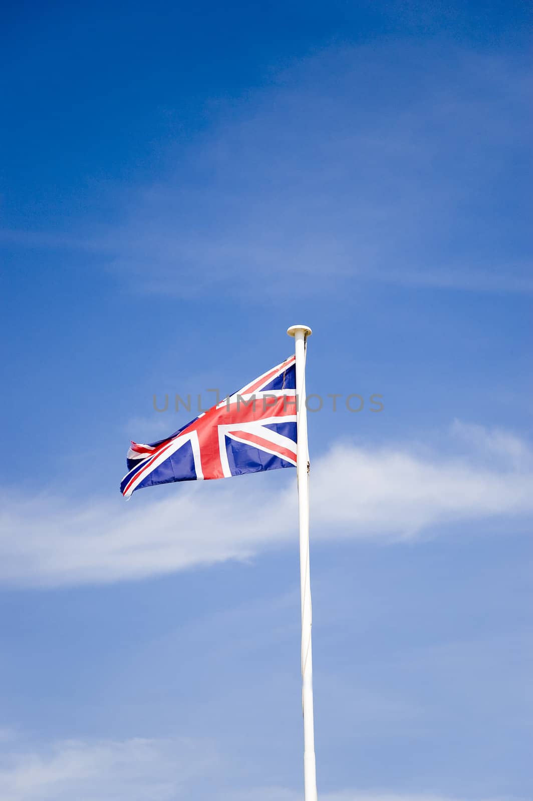 A union jack flag on a flag pole