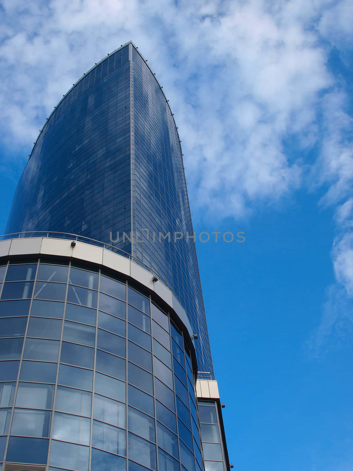 A skyscraper made of glass and concrete