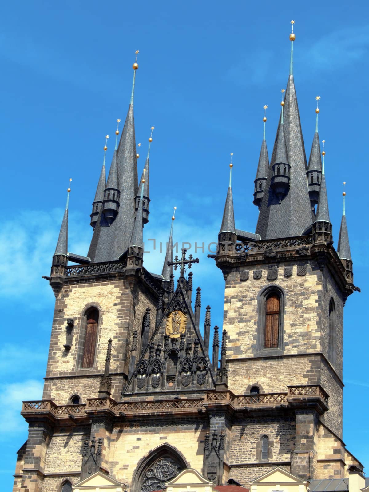 In the 11th century this area was occupied by a romanesque church, which was replaced by an early gothic Church of Our Lady before Tyn in 1256. Construction of present church started in the 14th century in late gothic style, under the influence of Matthias of Arras, and later Peter Parler. At the beginning of the 15th century, construction was almost done