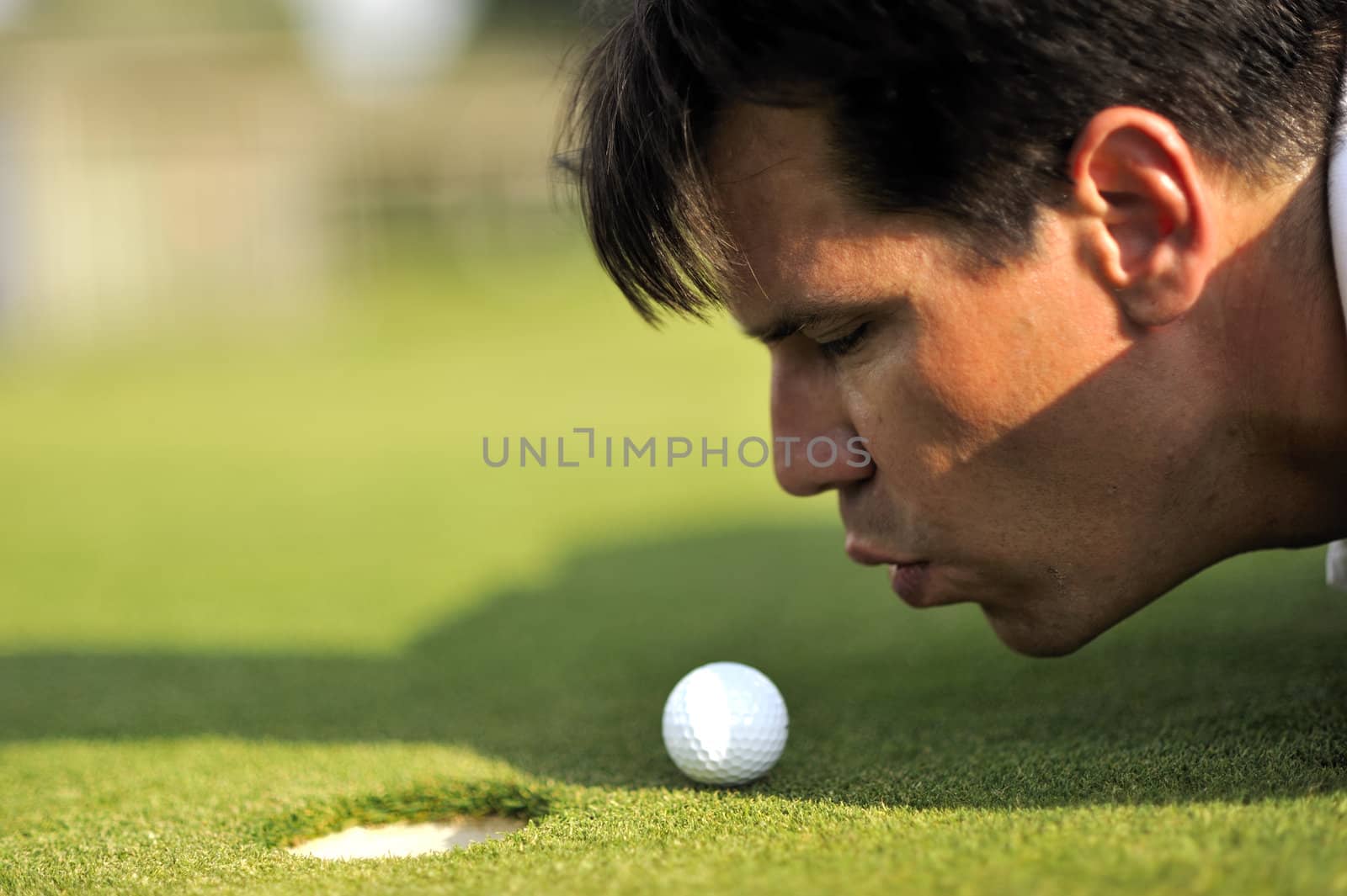 Man playing golf