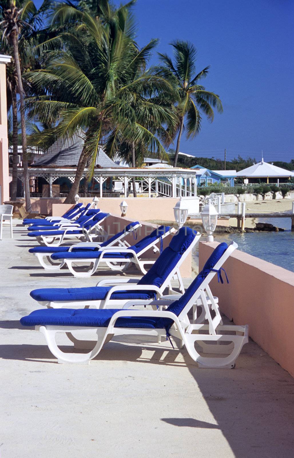 Empty deck chairs await vacationers in Great Exuma, the Bahamas.