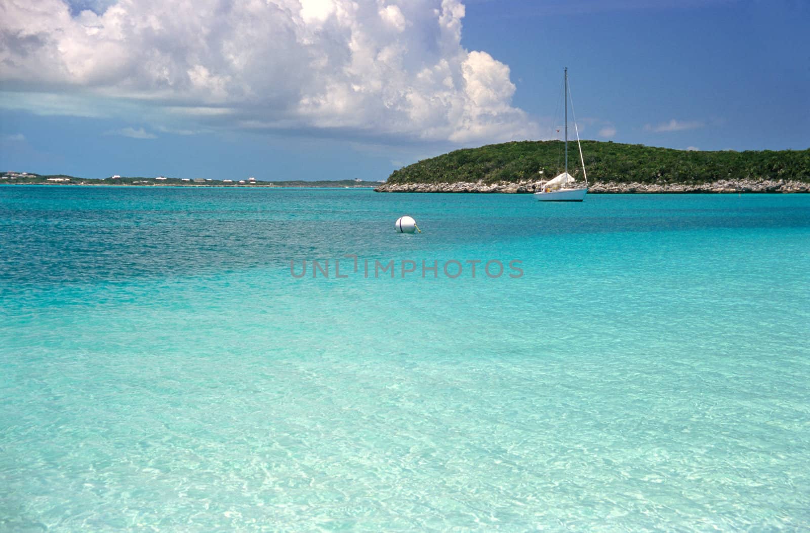Sailboat on the turquoise caribbean sea by ACMPhoto