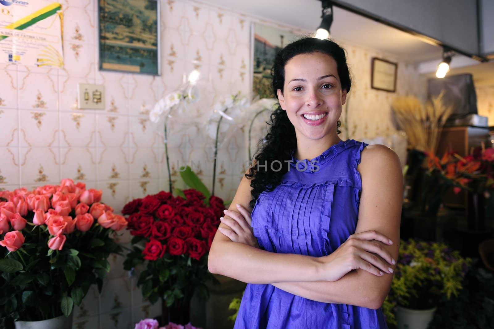 small business: happy owner of a flower shop