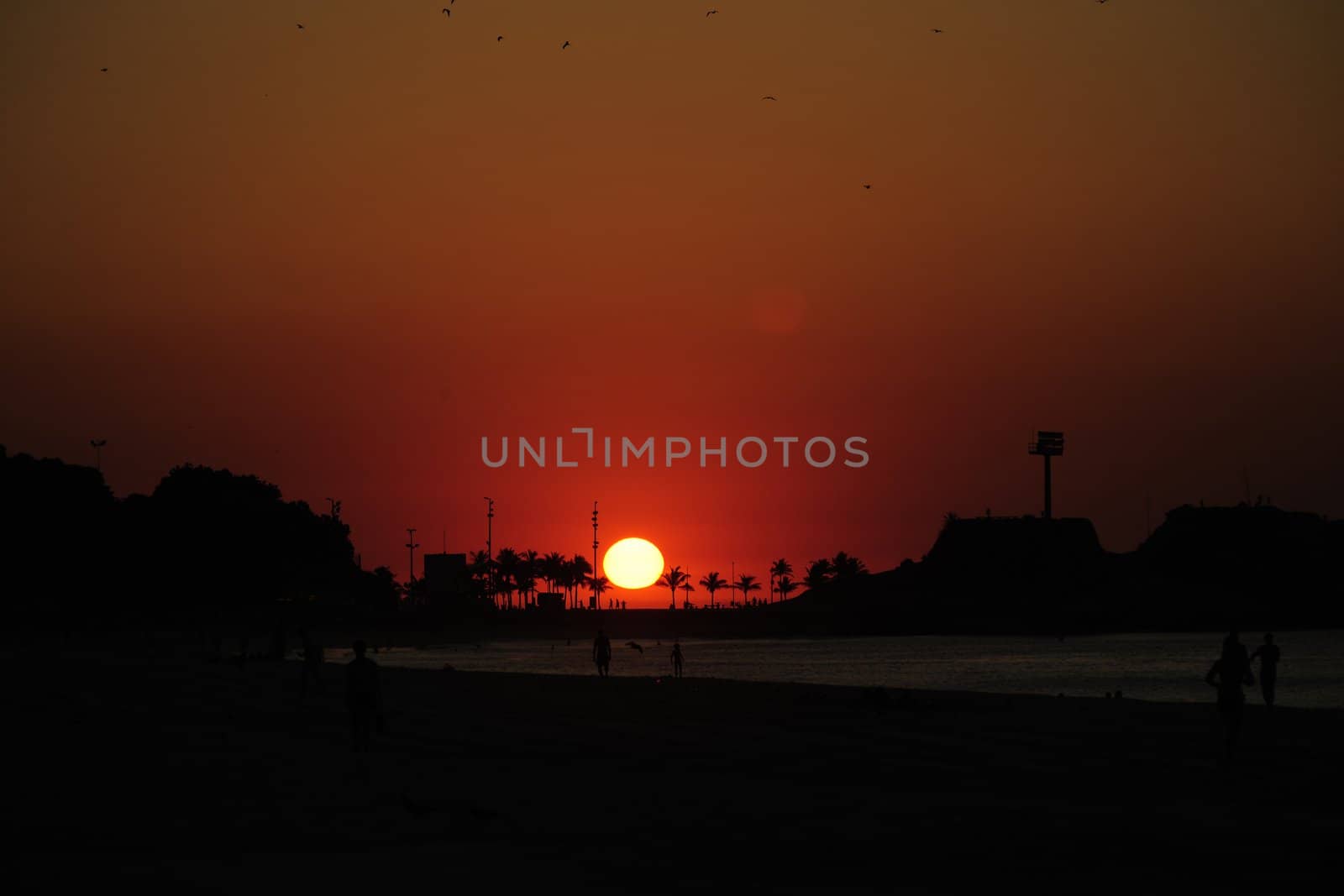 Sunrise in Rio de Janeiro, Ipanema beach and  Arpoador  by mangostock