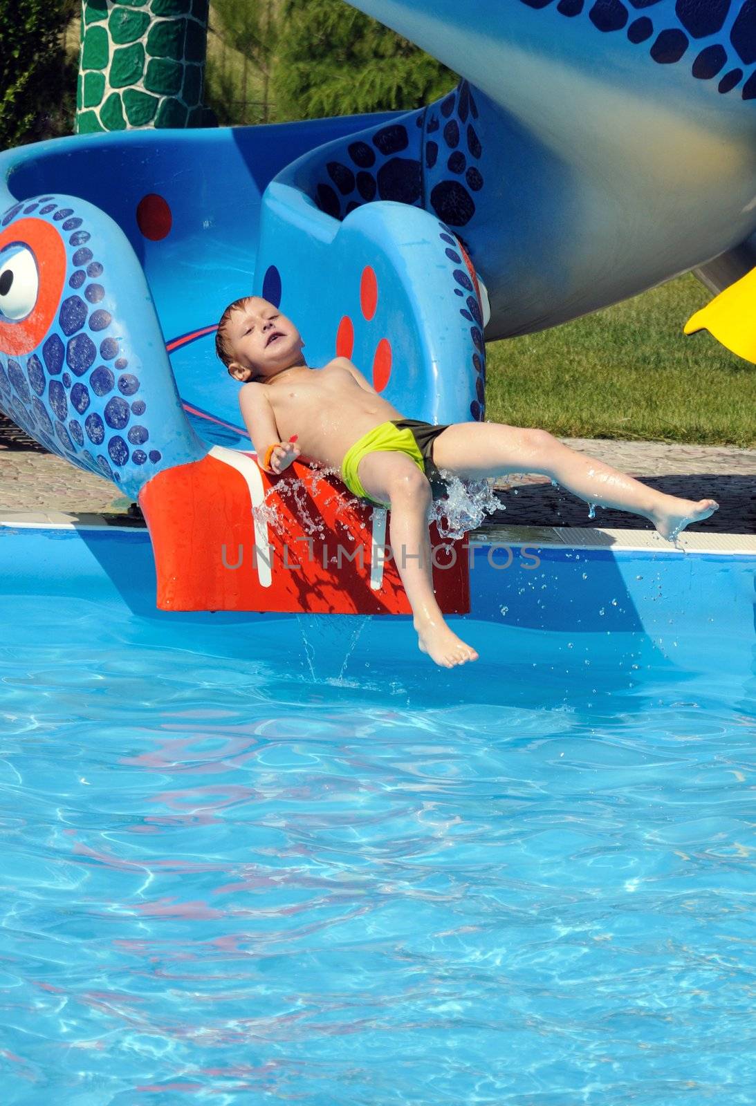 boy on Water Slide by Reana